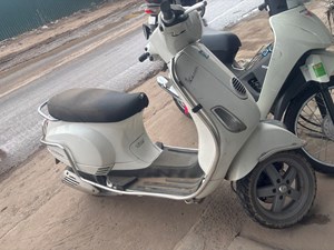LX125